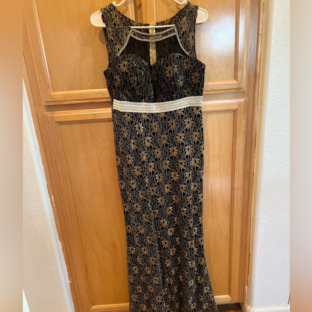 Black and gold vwry good condition one time waer only